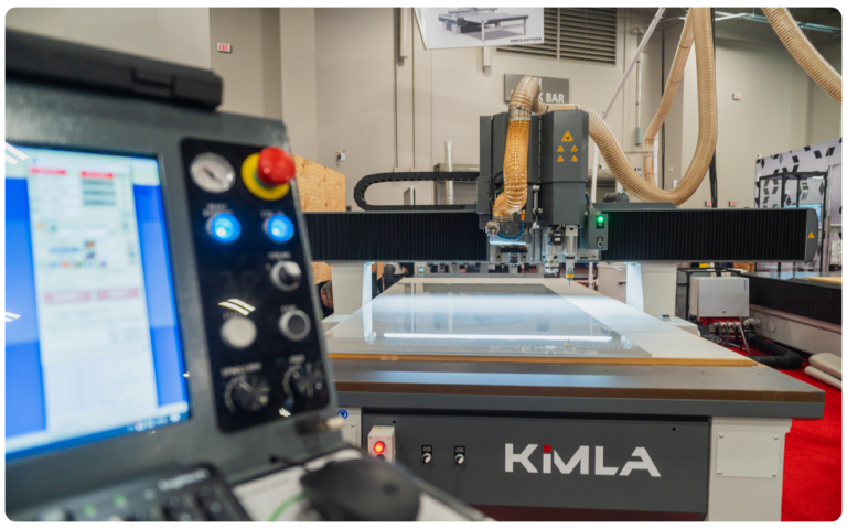 Kimla Madonna CNC router cutting acrylic, with operator control panel